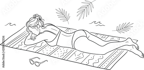 Canvas Print Woman relaxing on beach mat by the sea