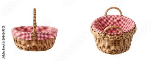 Two empty woven wicker baskets with red and white checkered fabric liners isolated on transparent background