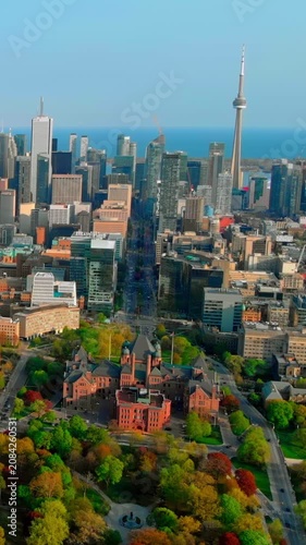 Urban nature panorama. Expansive urban landscape showcasing natural beauty and historic architecture. Wide view of city blending natural elements with ancient structures and colorful trees
