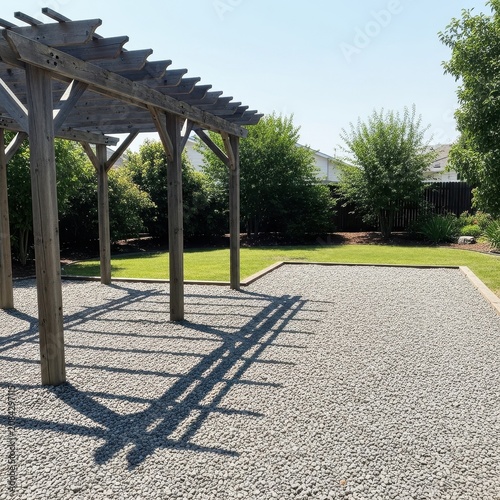 Wooden Arbor Structure in Backyard with Green Grass and Trees