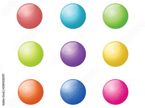 Collection of various glossy colored spheres with light reflections.