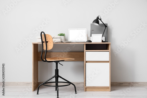 Workplace with laptop and f...