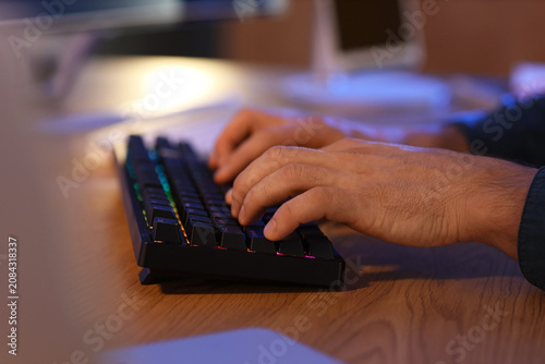 Male programmer working in ...