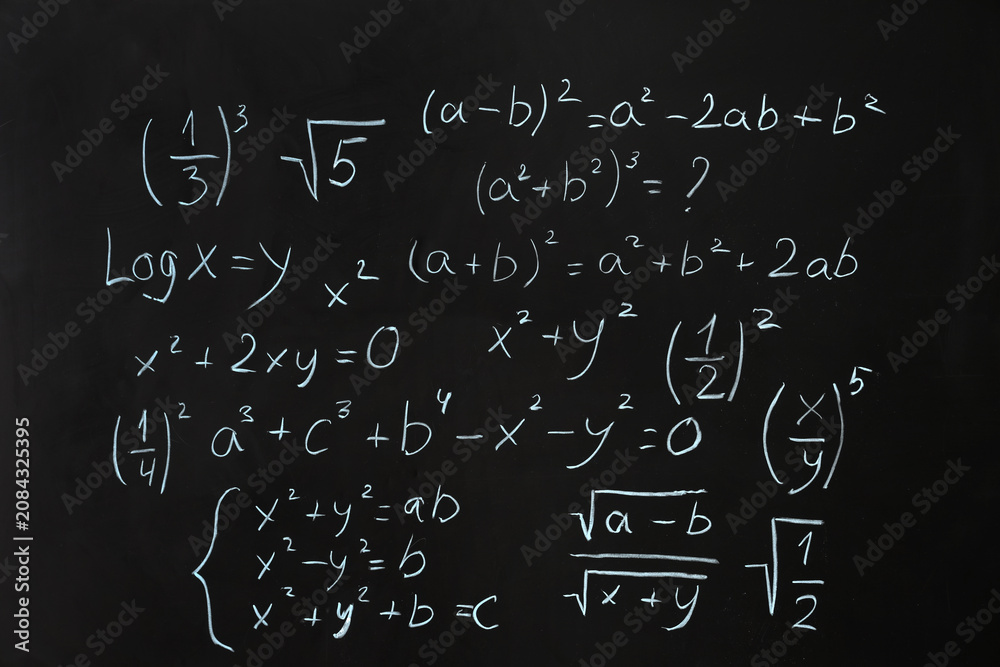 Obraz premium Different math formulas on black chalkboard
