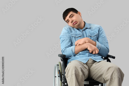 Young man in wheelchair on ...