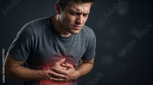 Man with severe abdominal stomach pain