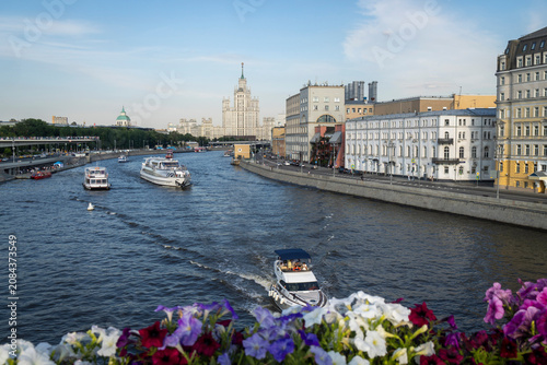 Photography Moscow, Russia – July 4, 2026:  View of Moskva River with tour boats and Kotelni