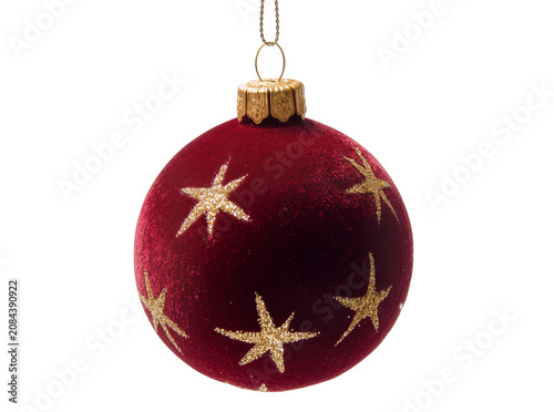 Fotografie Isolated festive red velvet Christmas ornament adorned with sparkling gold glitt