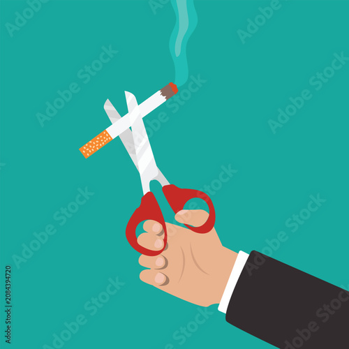 Bild auf Leinwand Hand cutting cigarette using scissors