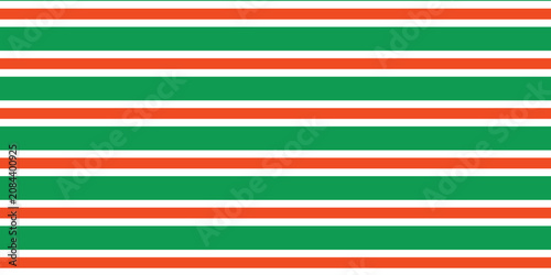 Christmas seamless pattern. Red and green diagonal stripes background. Candy cane repeating decoration wallpaper. Winter holiday lines backdrop. Xmas peppermint present wrapping print design. Vector