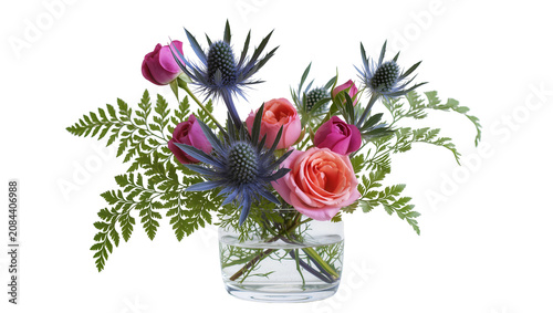 Fotografie Isolated fresh bouquet with pink roses, blue thistles, and green fern leaves in