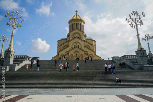 Fotografie 14 October 2017 Editorial: People ascend Holy Trinity Cathedral (Sameba) grand stone stairs, Tbilisi, Georgia