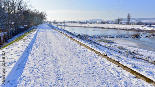 Konstfotografi A white landscape on a clear but very cold winter’s day on the banks of the River Mures