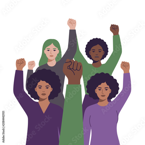 Diverse women raise their fists in solidarity and protest