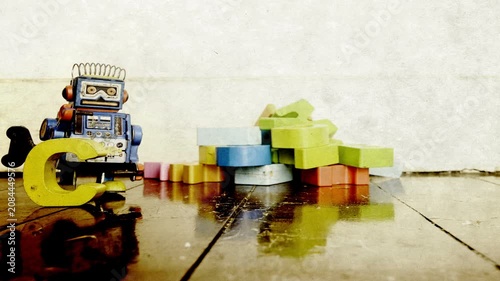 Vintage robots say CODE with wooden letters, stop motion animation 