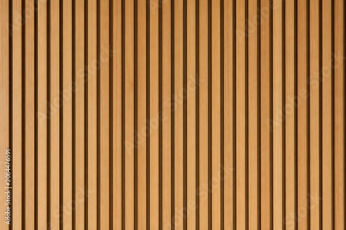 Wooden slats creating a modern geometric wall panel pattern