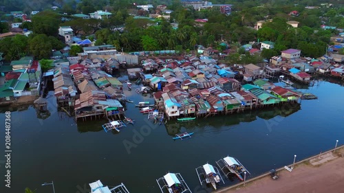 Coron Palawan stilt houses built settlement over water. Best aerial view drone