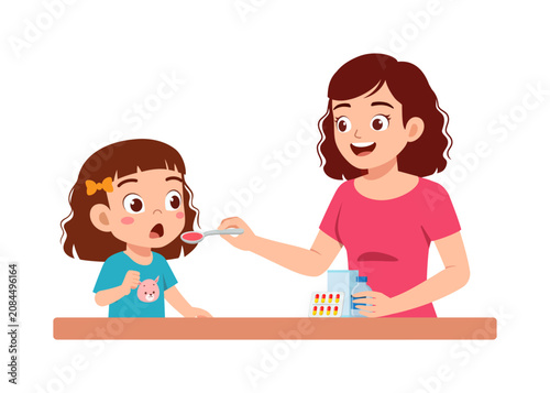 Asian Woman Smiling Happily Giving Spoonful Medicine to Little Girl Looking Surprised at Table