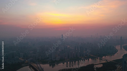 Aerial Timelapse Panorama of Wuhan City Skyline at Sunrise, Yangtze River and Wuhan Yangtze River Bridge at Dawn, Hubei China