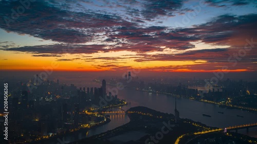 Aerial Timelapse Panorama of Wuhan City Skyline at Sunrise, Yangtze River and Wuhan Yangtze River Bridge at Dawn, Hubei China