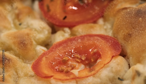 Quadro su tela Slice of Ligurian focaccia with fresh tomato, mozzarella, basil leaf and extra v