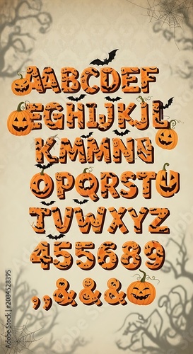 Vintage alphabet and number wooden blocks on aged paper background.