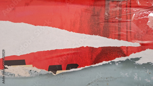 Fotografie Old and weathered paper, torn and ripped street poster background, messy art col
