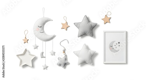 Collection of white and grey moon and star themed nursery decor items including a mobile, plush stars, and framed art on a white background.