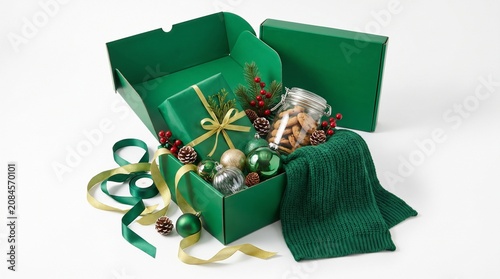 Green Christmas Gift Box Filled With Ornaments Cookies and Wrapped Present