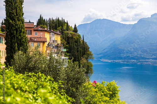Photography Village of Tremosine sul Garda perched on the edge of a limestone cliff dropping