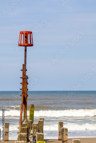 Hazard Marker Posts on Ostend beach Norfolk