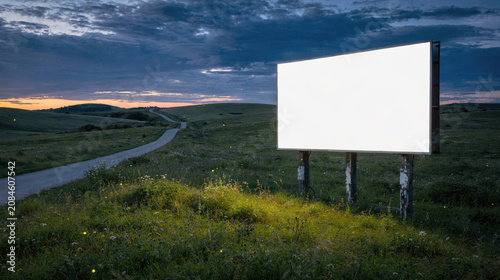 Blank Billboard in Rural Dusk Landscape