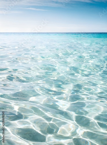 Crystal Clear Shallow Tropical Sea with Turquoise Water and Sandy Bottom