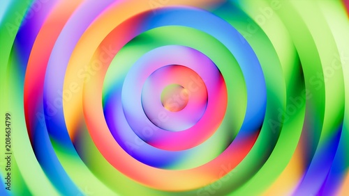 Abstract multicolored background. Spiral neon rings in rainbow colors swirl toward the center. Dynamic circular gradient with a hypnotic look