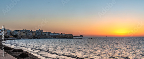 Fotografía Trapani, lo spettacolo del tramonto, quando il sole si immerge nel mare all’oriz