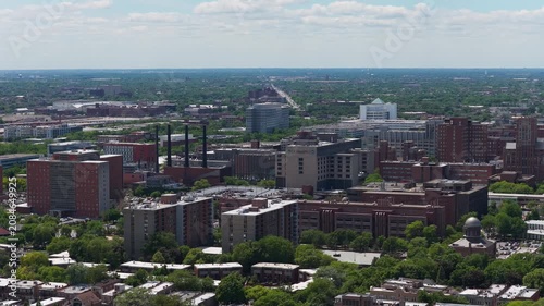 Distant aerial showing Chicago's West Loop Gate neighborhood and Illinois Medical District with Cook County Hospital, Rush University Medical Center, residential apartments