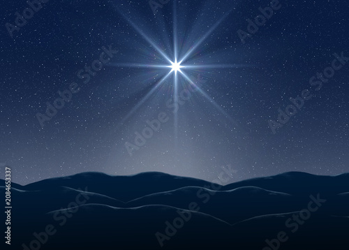 Birth of Christ, Christmas star of the Nativity of Bethlehem, Nativity of Jesus Christ. Background of the beautiful dark blue starry sky and bright star.