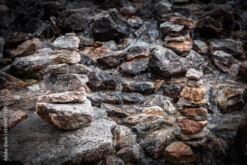 фотографія Outdoor man-made balanced stone cairns