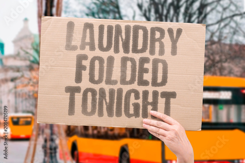 Canvastavla "Laundry folded tonight" A quiet chore at the end of day