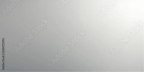 Fotografía A smooth, reflective metallic surface shines with a bright light source casting subtle gradients and creating a minimalist, abstract backdrop