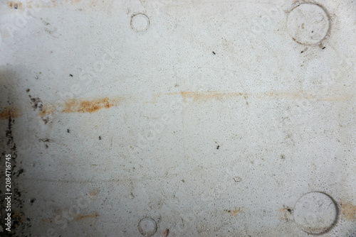 Tableau sur toile The bottom of a black plastic seedling tray placed upside down on the soil surface