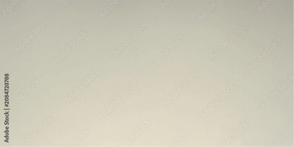 Fototapeta premium A single white dove is captured in flight, its wings spread wide against a soft, neutral background, symbolizing peace and freedom.