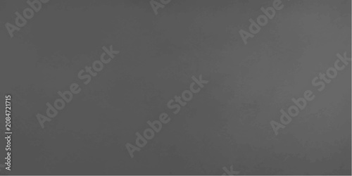 Foto A plain grey background offers a neutral canvas, devoid of any specific subject or detail, suitable for a multitude of design applications or as a placeholder