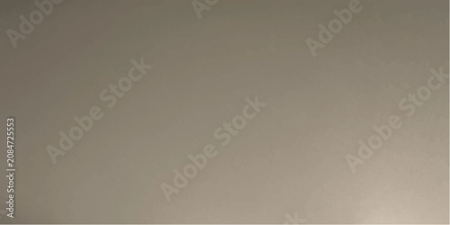 Fotografie A smooth, textured wall surface in a neutral taupe color, suitable for architectural backgrounds and interior design inspiration