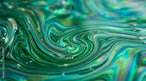 iridescent fluid abstract background, green and teal oil slick texture, nature inspired colors flowing, smooth liquid surface, macro photography style, ultra high resolution