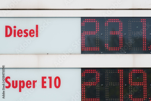 Gas station price tower displaying Super E10 and Diesel fuel rates