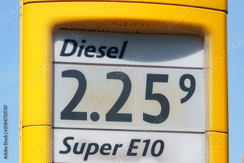 Gas station price tower displaying Super E10 and Diesel fuel rates