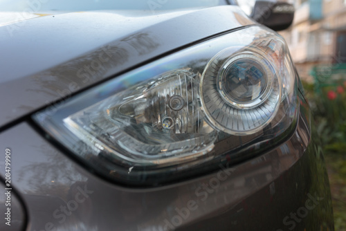 Close-up of Car Headlight on Street