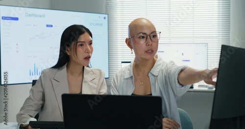 Professional women in a boardroom meeting. Talking about new ideas and reports to improve company partnership and togetherness during a corporate project discussion.