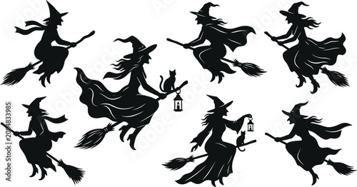Halloween witches silhouettes flying on broomsticks